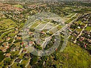 Aerial of upscale residential developments in Las Pinas, Metro Manila, along Daang Hari Road