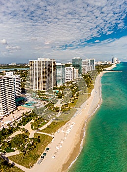 Aerial vertical panorama Miami Beach Bal Harbour FL USA beachfront real estate condominium apartments