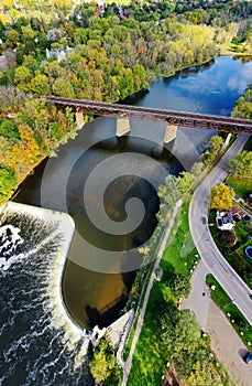 Aerial vertical of Paris, Ontario, Canada railway bridge and dam
