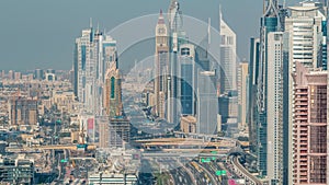 Aerial vew of Dubai Marina with shoping mall, restaurants, towers and yachts timelapse, United Arab Emirates.