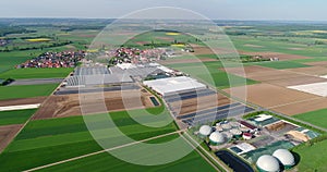 Aerial video of Biogas plant. The agricultural and greenhouse complex is equipped with its own biogas for the production