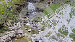 Aerial video Cascada Cola de Caballo waterfall under Monte Perdido at Ordesa Valley Aragon Huesca Pyrenees of Spain