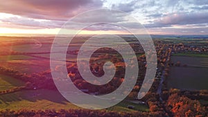 Aerial video establishing shot of countryside in Oxfordshire at dusk