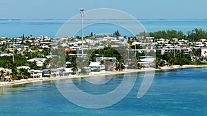 Aerial video neighborhood homes in the Florida Keys with antenna tower