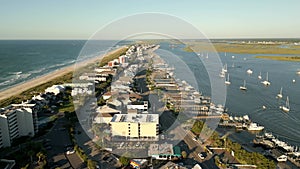 Aerial video sailboats and vacation homes in Wrightsville Beach NC