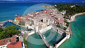 Aerial video of Sirmione village and castle, Garda lake, Italy