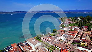 Aerial video of Sirmione village and castle, Garda lake, Italy