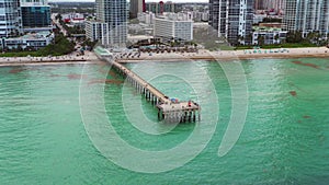 Aerial video Sunny Isles fishing pier descent and approach flyby