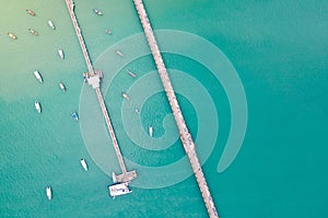 Aerial view of 2 bridges with boats anchored at Chalong Pier