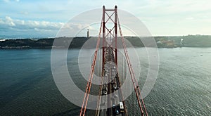 Aerial view of 25th April Bridge in Lisbon, Portugal. Famous landmark on river Tagus.