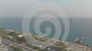 Aerial View 4K drone shot of Limassol\'s Sea boulevard with palmtrees, Cyprus