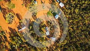 Aerial view of 4WD`s and caravans camped for the night in the outback of Australia