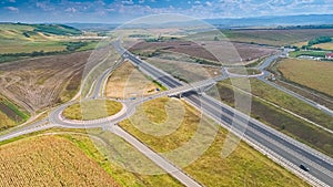 Aerial view of A1 Transylvania Highway between Sibiu and Sebes with spectacular viaduct bridge and passage route, roads of Romania