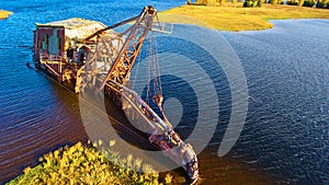 Aerial View of Abandoned Quincy Dredge in Golden Light