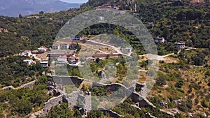 Aerial view of an abandoned ruins, part of dead town in the province of Spain. Clip. Flying over ancient archaeological