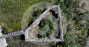 Aerial view. Abandoned tower of the ruins of St Benedek castle in Transylvania
