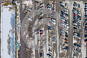 Aerial view from above car standing on parking lot place