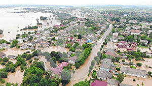 Aerial View from above on the flooded houses and the city. Flood after floods from the mountains. The houses are flooded