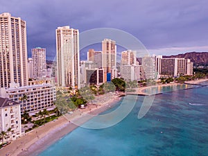 Aerial view from above on the Honolulu city skyline on a cloudy day background