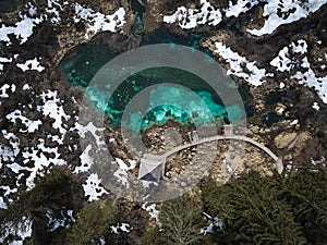 Aerial view above Lake Zelenci nature park in winter, Slovenia