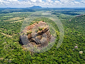 Aerial view from above of Sigiriya or the Lion Rock, an ancient fortress, palace with terracesin Dambulla, Sri Lanka. photo