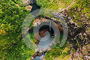 Aerial view from above of the Tamarin waterfall seven cascades in the tropical jungles of the island of Mauritius
