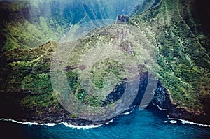 Aerial view of the abrupt and green Napali Coast in Kauai, US