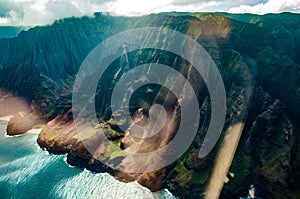 Aerial view of the abrupt and green Napali Coast in Kauai, US