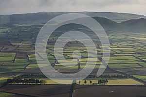 Aerial view on abstract pattern of fields at Serra do Cume and Serra da Ribeirinha before or after sunset or sunrise with low