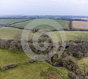 An aerial view across the abandoned Ingarsby Viaduct in Leicestershire, UK