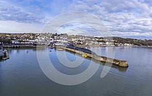 An aerial view across the harbour wall and village of Saundersfoot, Wales