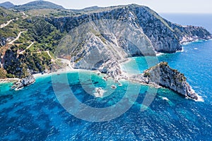 Aerial view Agia Eleni beach in Kefalonia Island, Greece. Remote beautiful rocky beach with clear emerald water and high