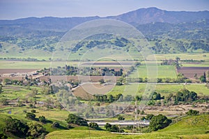 Aerial view of agricultural fields, mountain background, south San Francisco bay, San Jose, California