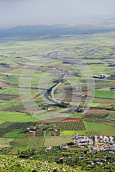 Aerial view of agricultural fields small city highway