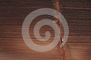 Aerial view of agricultural tractor on dirt road, drone pov