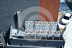 Aerial view of Air conditioner units (HVAC) installed on the roof of the building
