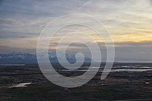 Aerial view from airplane of Antelope Island at sunset, view from Magna, sweeping cloudscape at sunrise with the Great Salt Lake