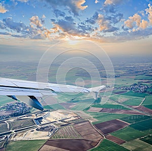 Aerial view through airplane porthole