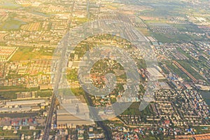 Aerial view from the airplane of Samut Prakan city. Samut Prakan is at the mouth of the Chao Phraya River on Gulf of Thailand