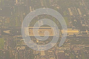 Aerial view from the airplane of Wat Phra Dhammakaya, a Buddhist temple (wat) in Khlong Luang District, in the Pathum Thani