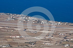 Aerial view of the airport runway in Santorini Island with Aegean Sea in Greece