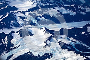 Aerial view of Alaska ice mountains covered with snow