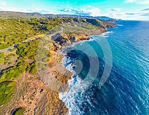 Aerial view of Alghero rocky shore at sunset