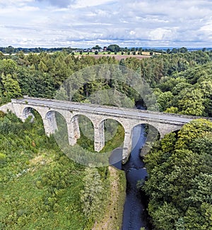 An aerial view along the River Nidd over the Nidd Gorge Viaduct in Yorkshire, UK