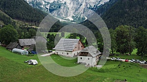 Aerial view of Alpine Valley with rustic farm in front