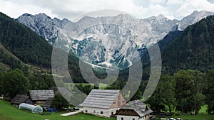 Aerial view of Alpine Valley with rustic farm in front