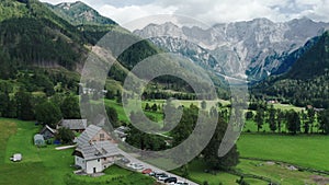 Aerial view of Alpine Valley with rustic farm in front