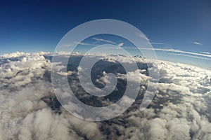 Aerial View - Alps, Clouds and Blue Sky