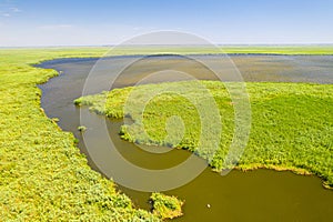 Aerial view of an amazing big lake in the heart of Danube Delta from Romania