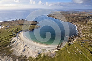 Aerial view on amazing Dog`s bay beach near Roundstone town in county Galway, Sandy dunes and beach and blue turquoise color wate